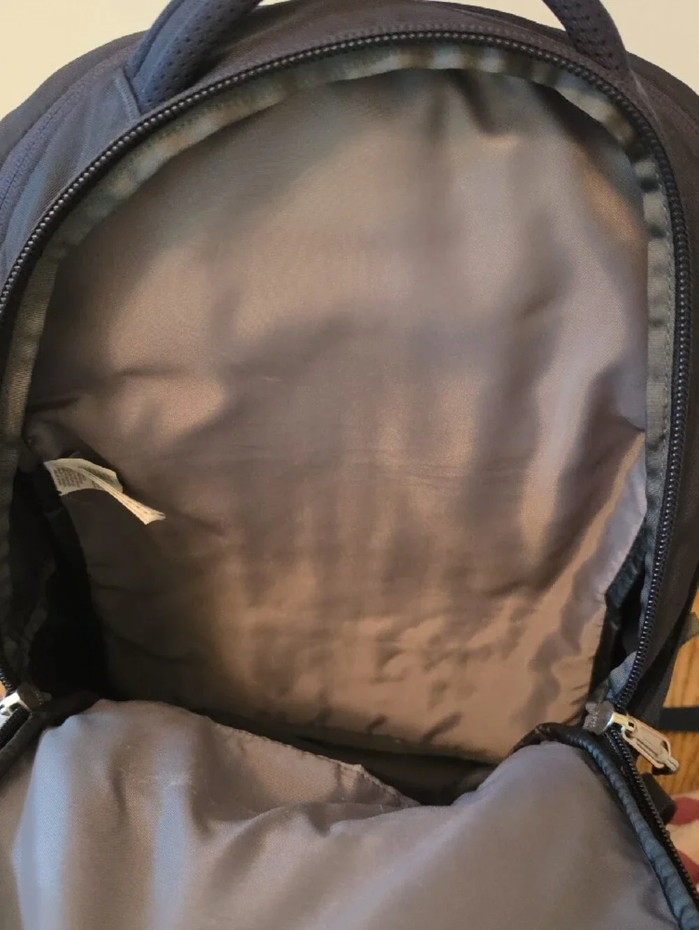 The North Face Navy Blue Backpack with Reflective Stripes